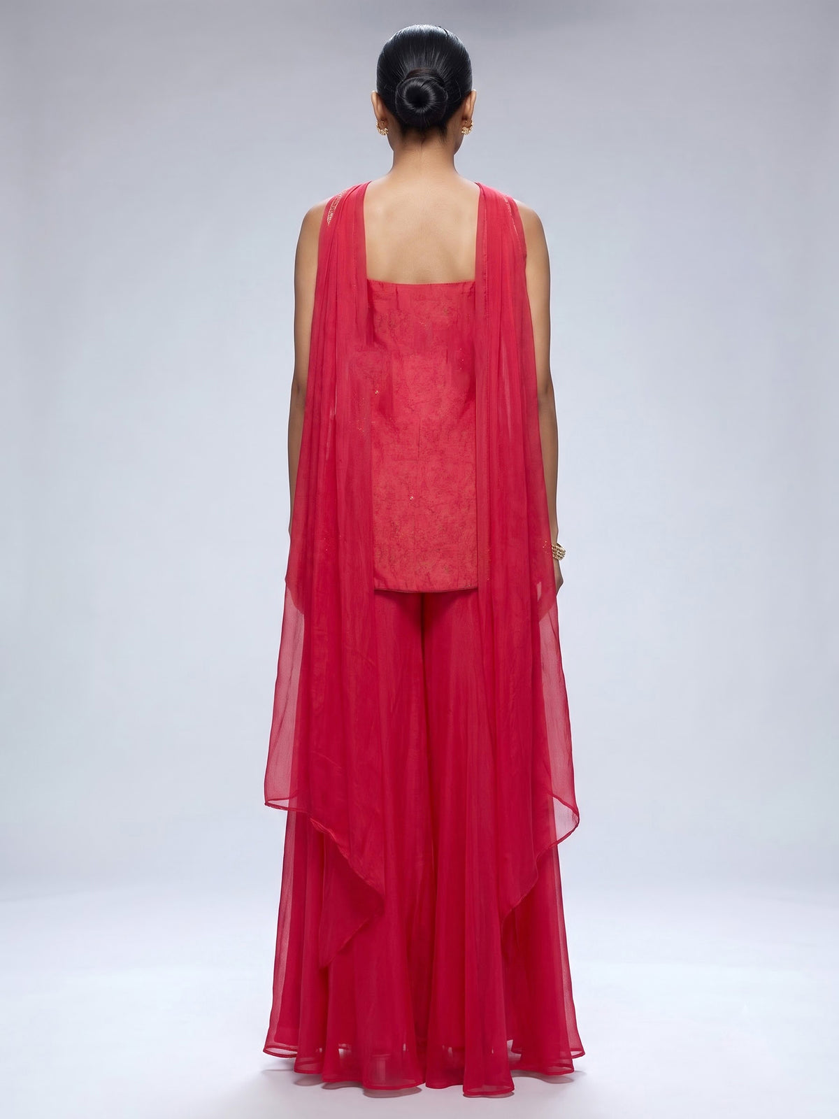Rani pink raw silk palazzo suit with elegant festive detailing