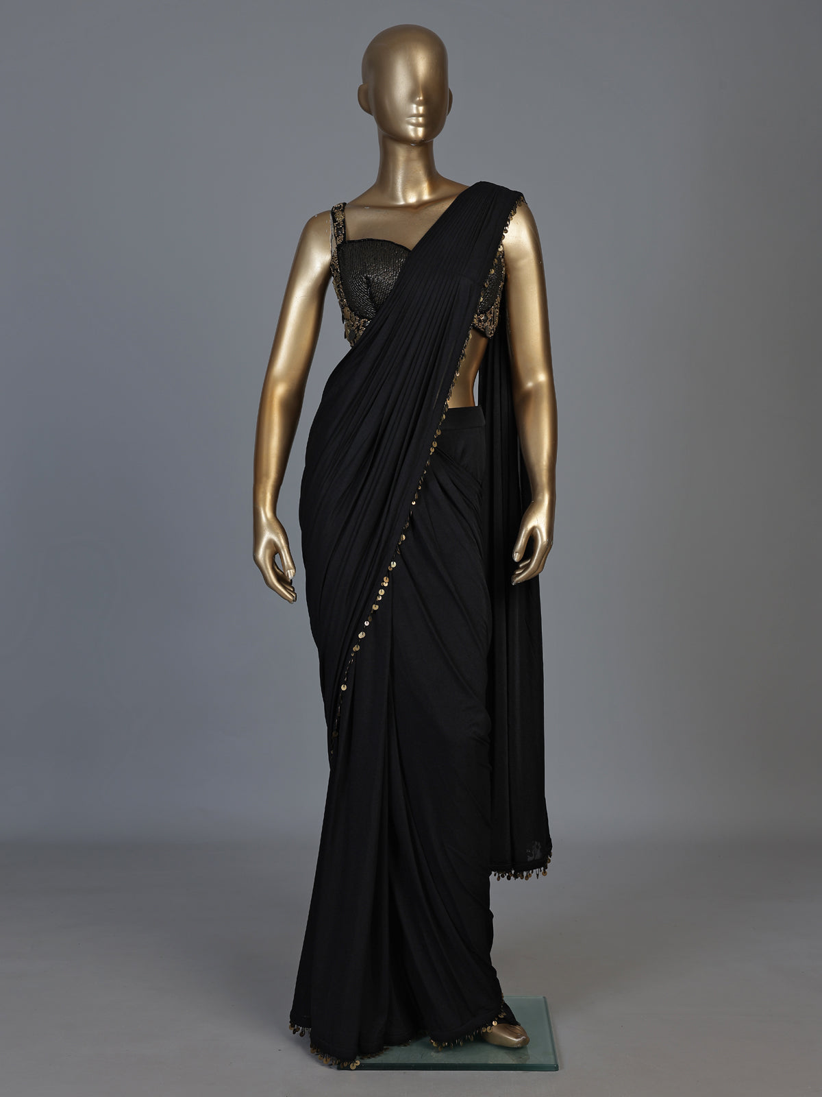 Black silk designer saree with elegant coin embellishments