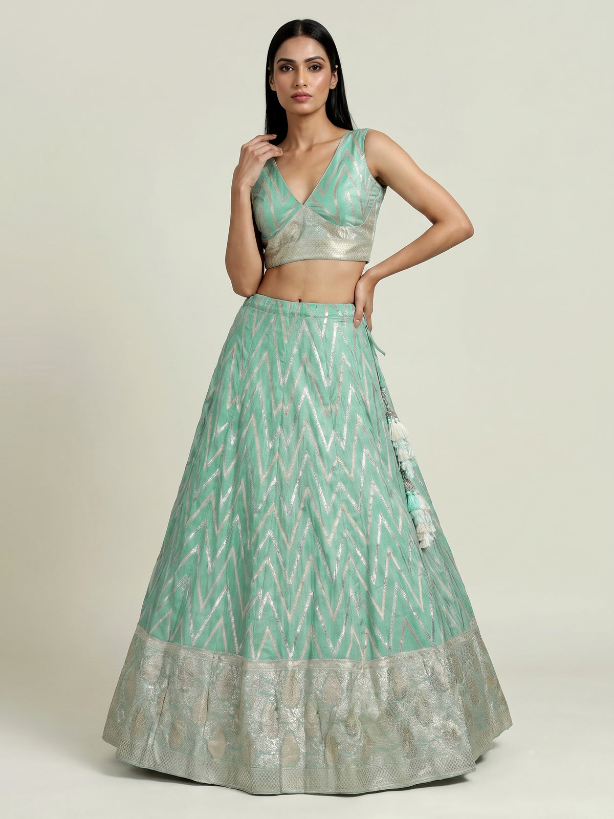 Mint green silk lehenga choli with embroidered sequin dupatta