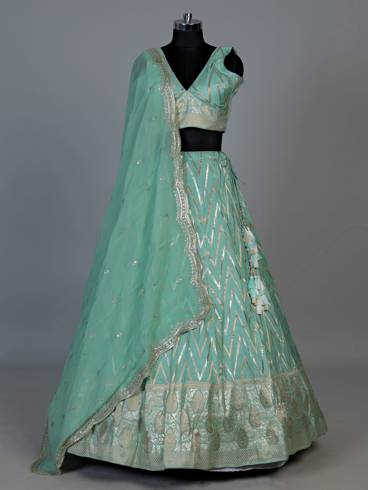 Mint green silk lehenga choli with embroidered sequin dupatta