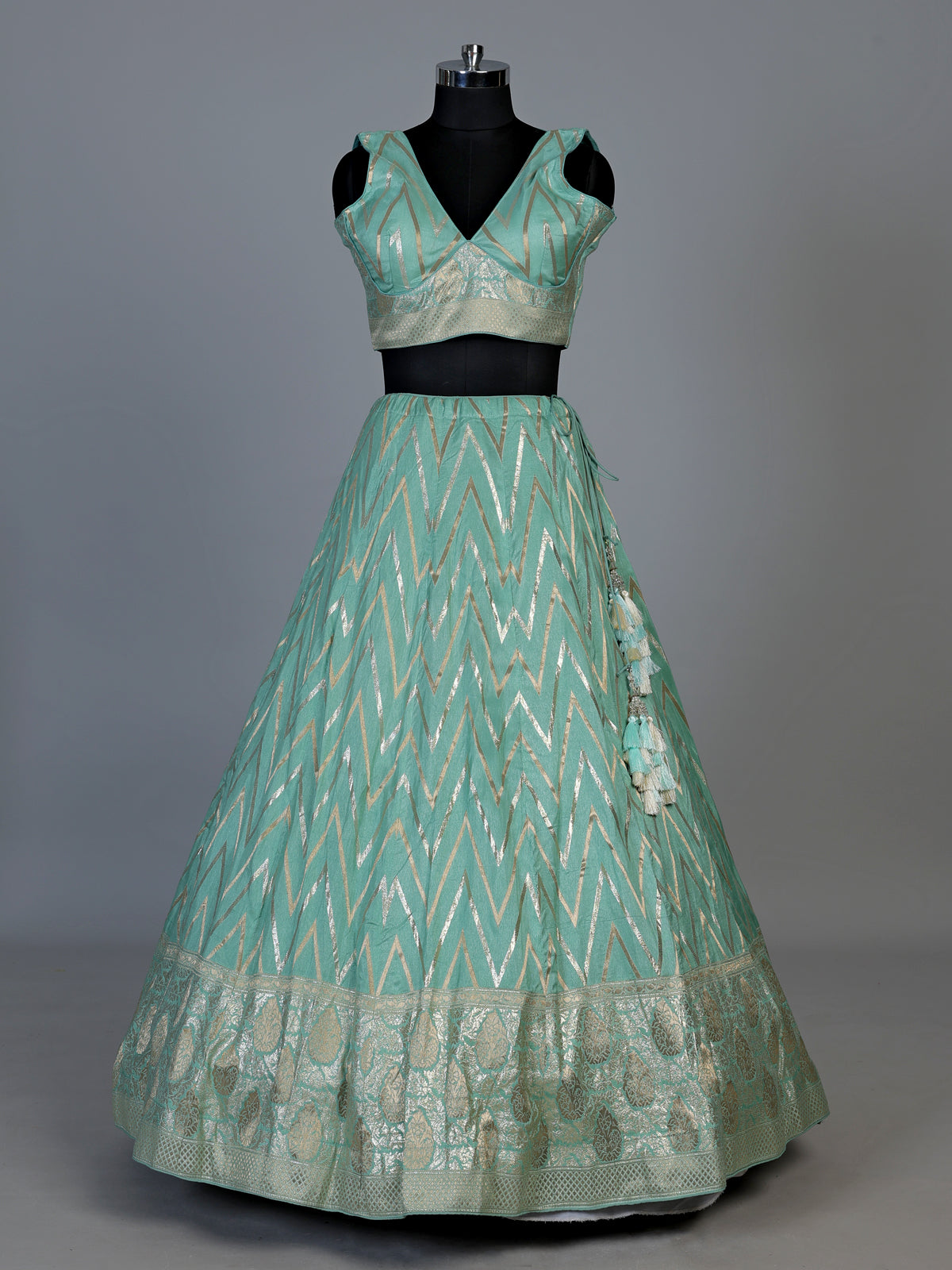 Mint green silk lehenga choli with embroidered sequin dupatta