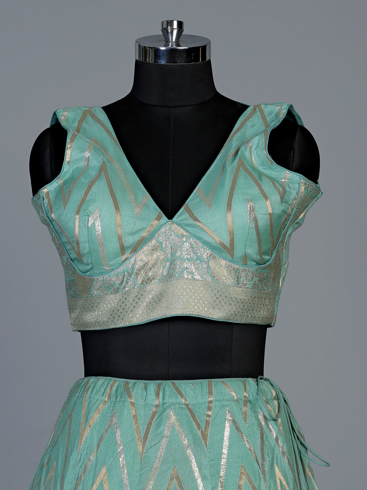 Mint green silk lehenga choli with embroidered sequin dupatta