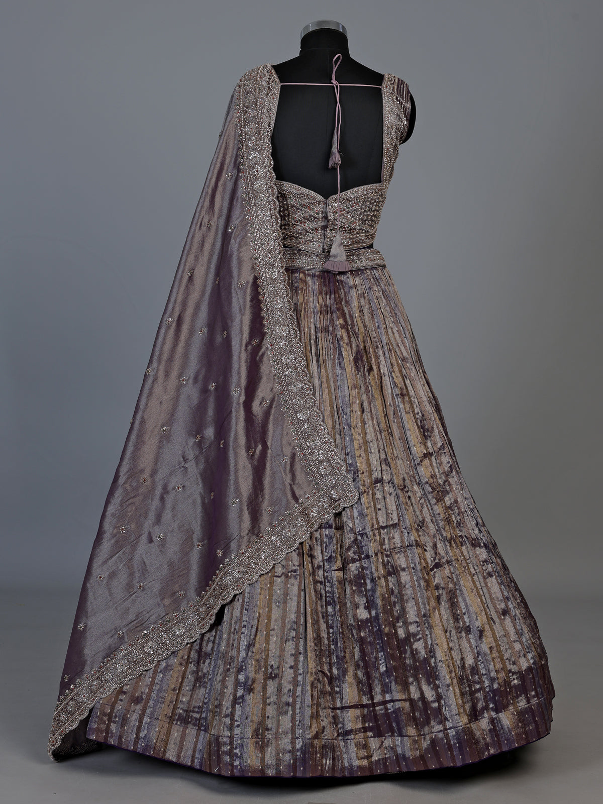 Pastel purple tissue silk lehenga choli with elegant dupatta