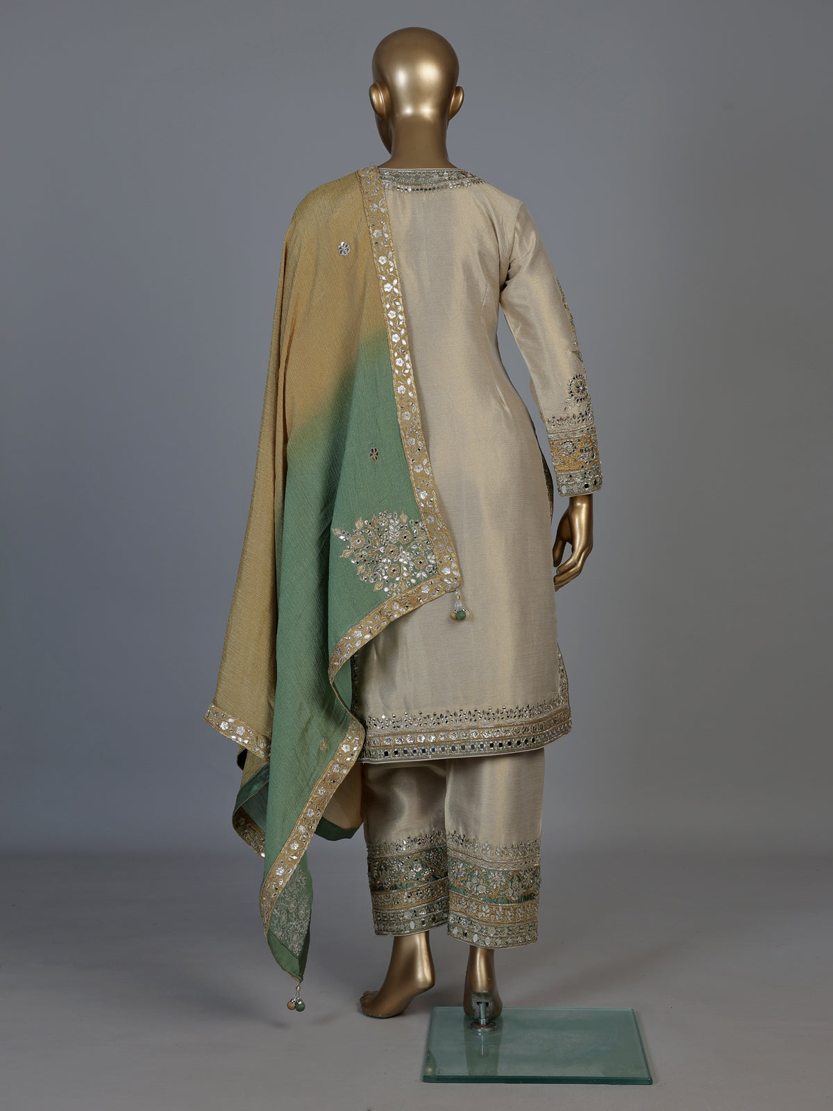 Beige chanderi silk salwar suit with green shaded dupatta