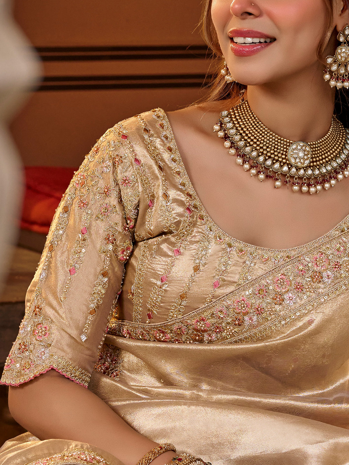 Beige tissue silk women saree with graceful embroidery