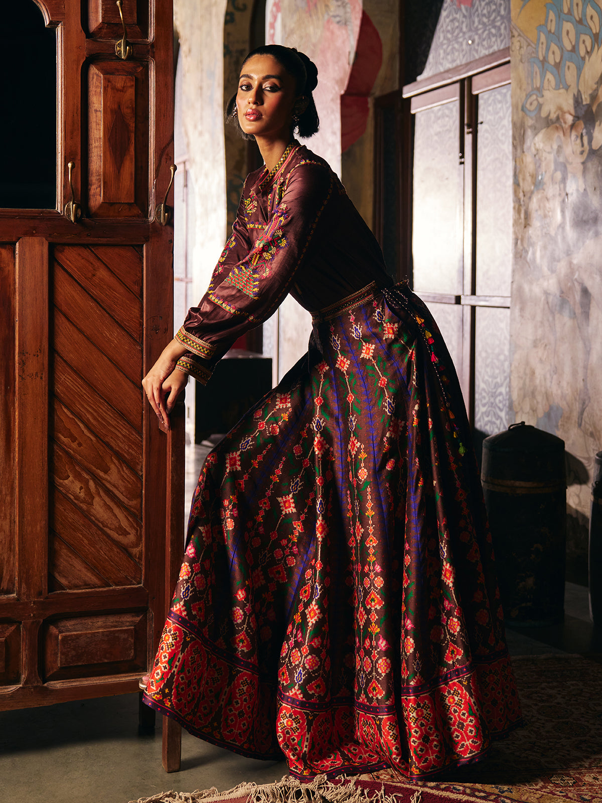 Brown womens floor length Patola suit with mirror embroidery