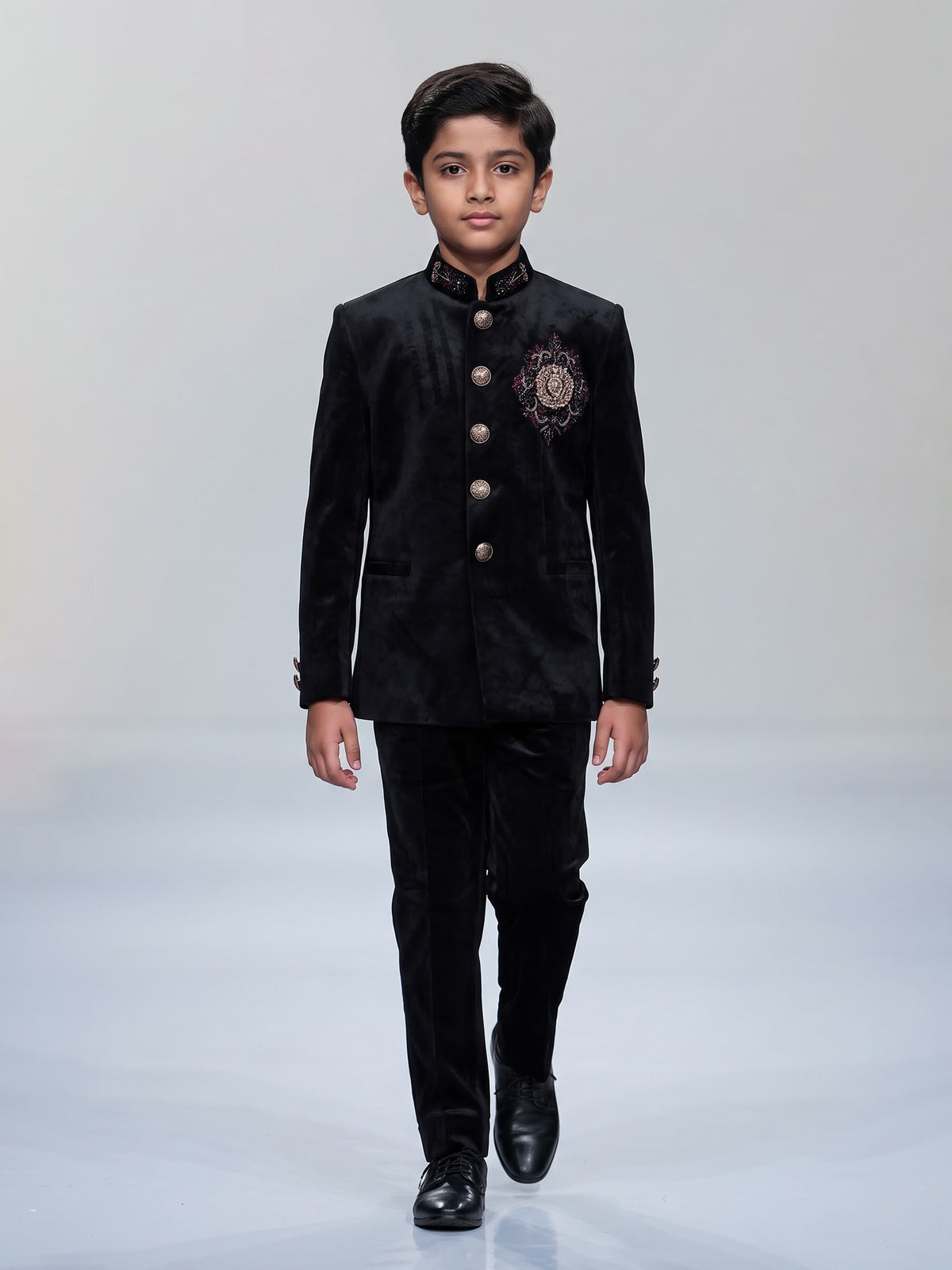Black velvet boys jodhpuri suit with regal crest detailing