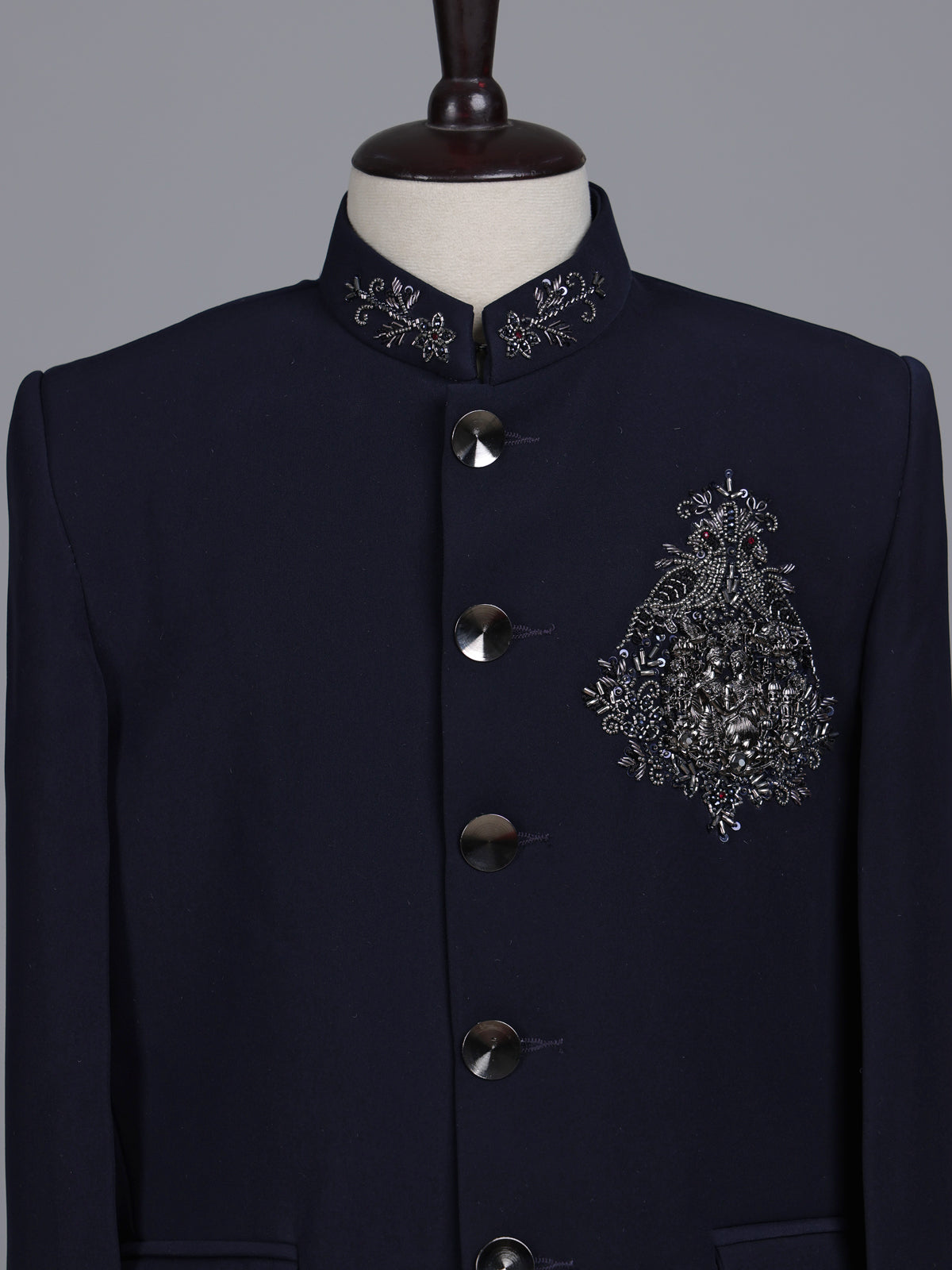 Navy boys jodhpuri suit with embellished crest motif for celebrations