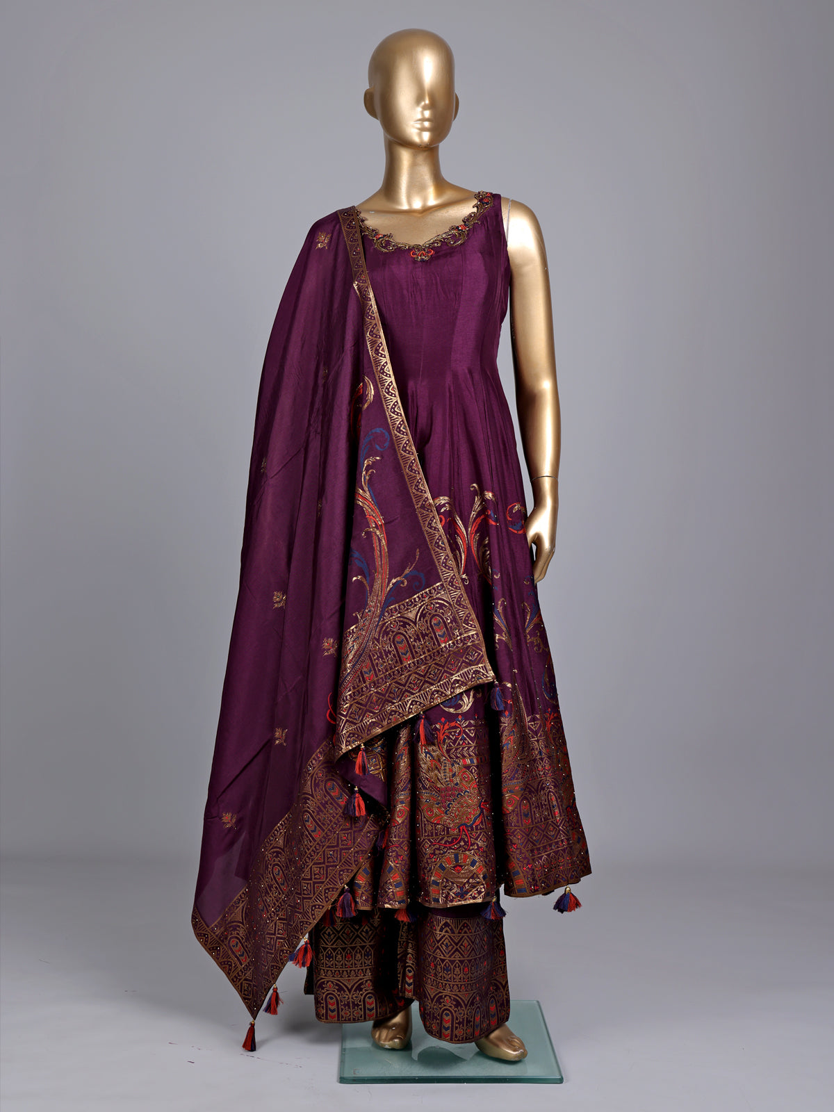 Purple silk anarkali suit with zardosi and pearl embellished details