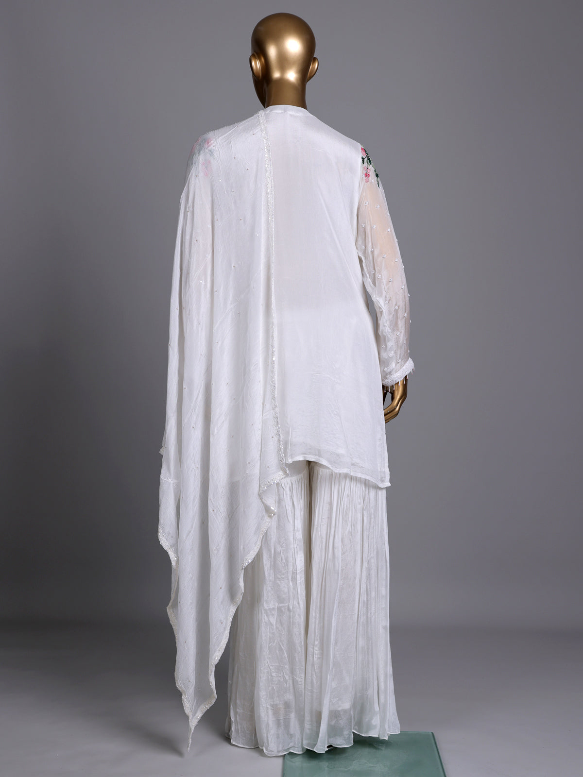 White tissue silk sharara suit with cutdana and tassel detailing