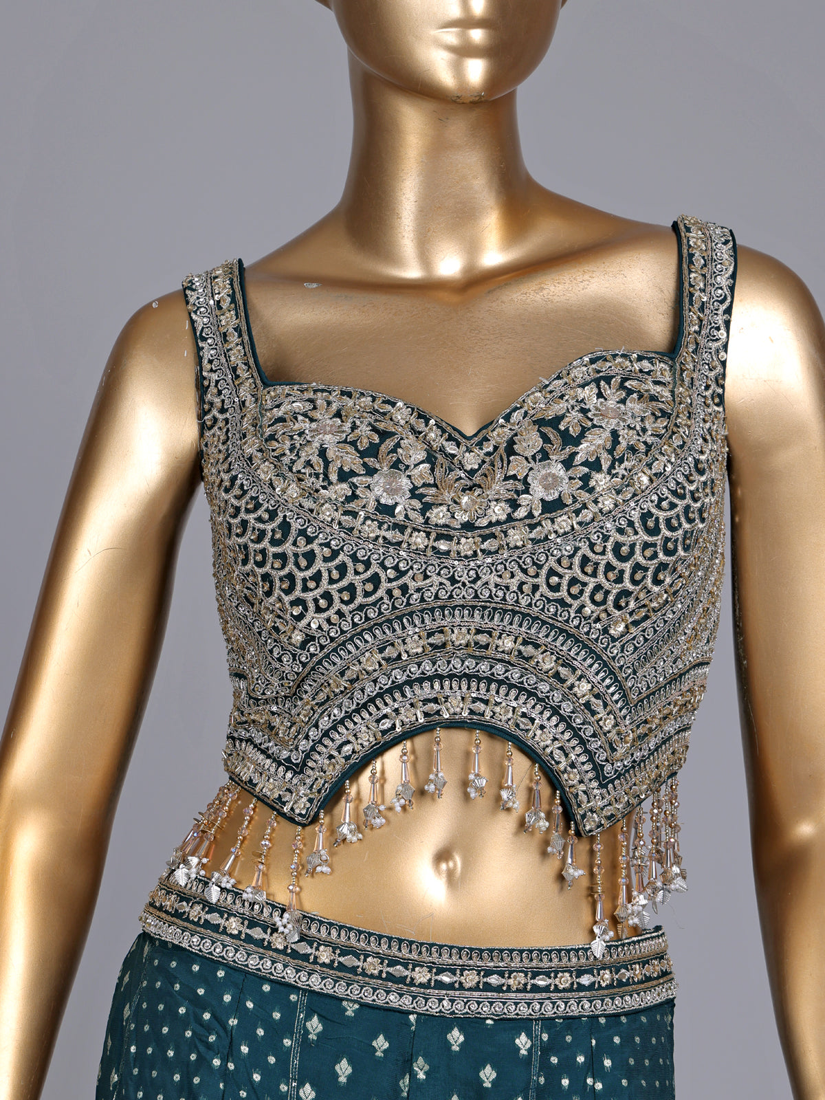 Peacock green soft georgette sharara suit with stone embellishments