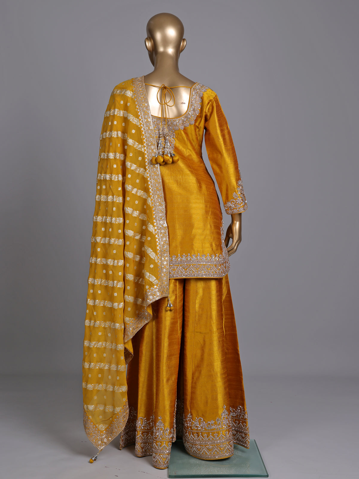Mustard yellow raw silk punjabi suit with zari dupatta detailing