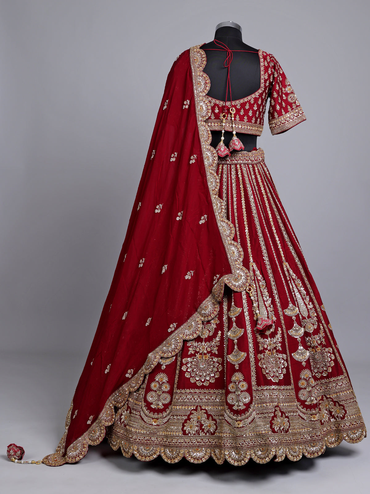 Maroon raw silk bridal lehenga choli with zardosi detailing