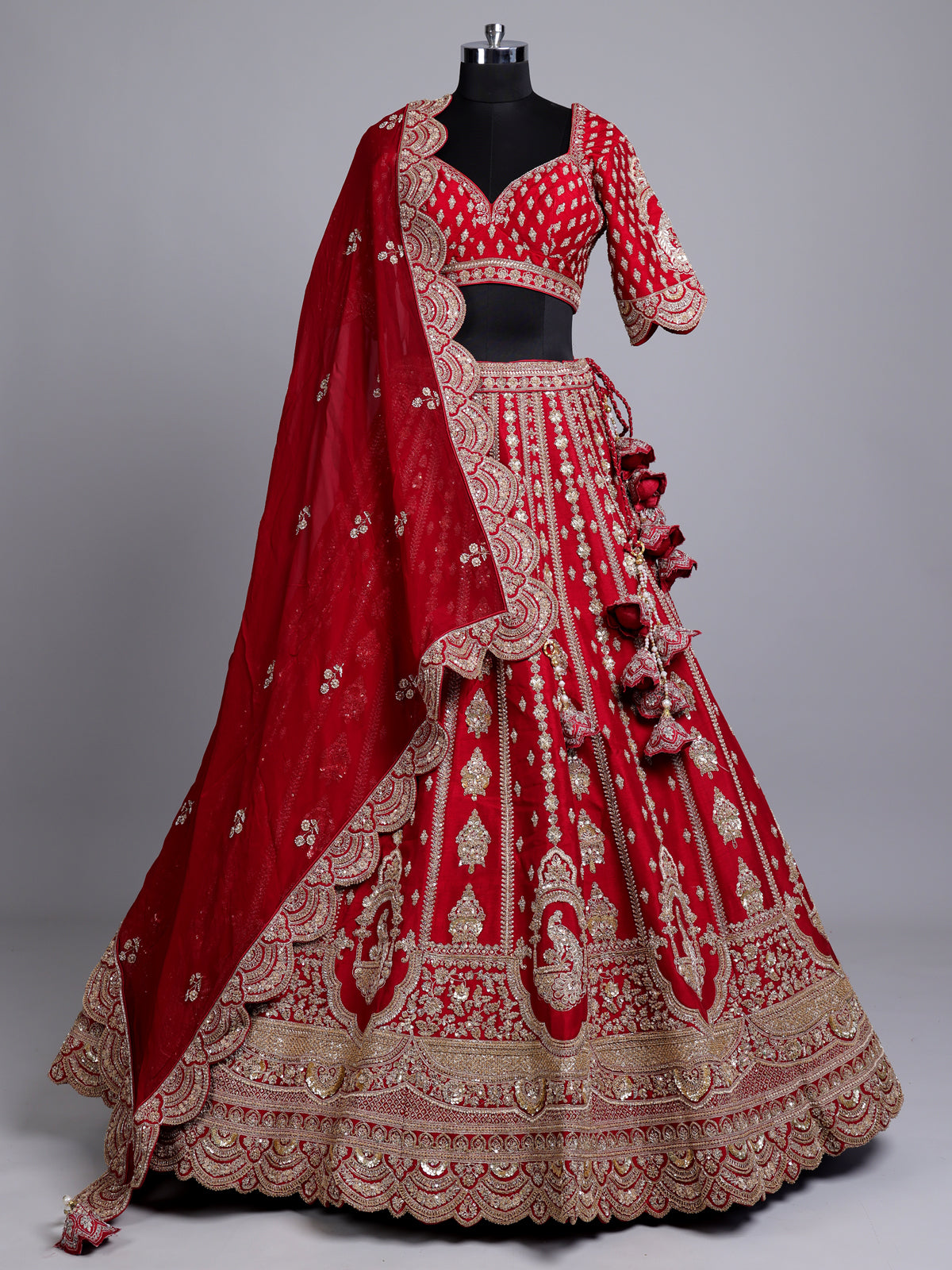 Red silk bridal lehenga choli with exquisite zardosi embellishments