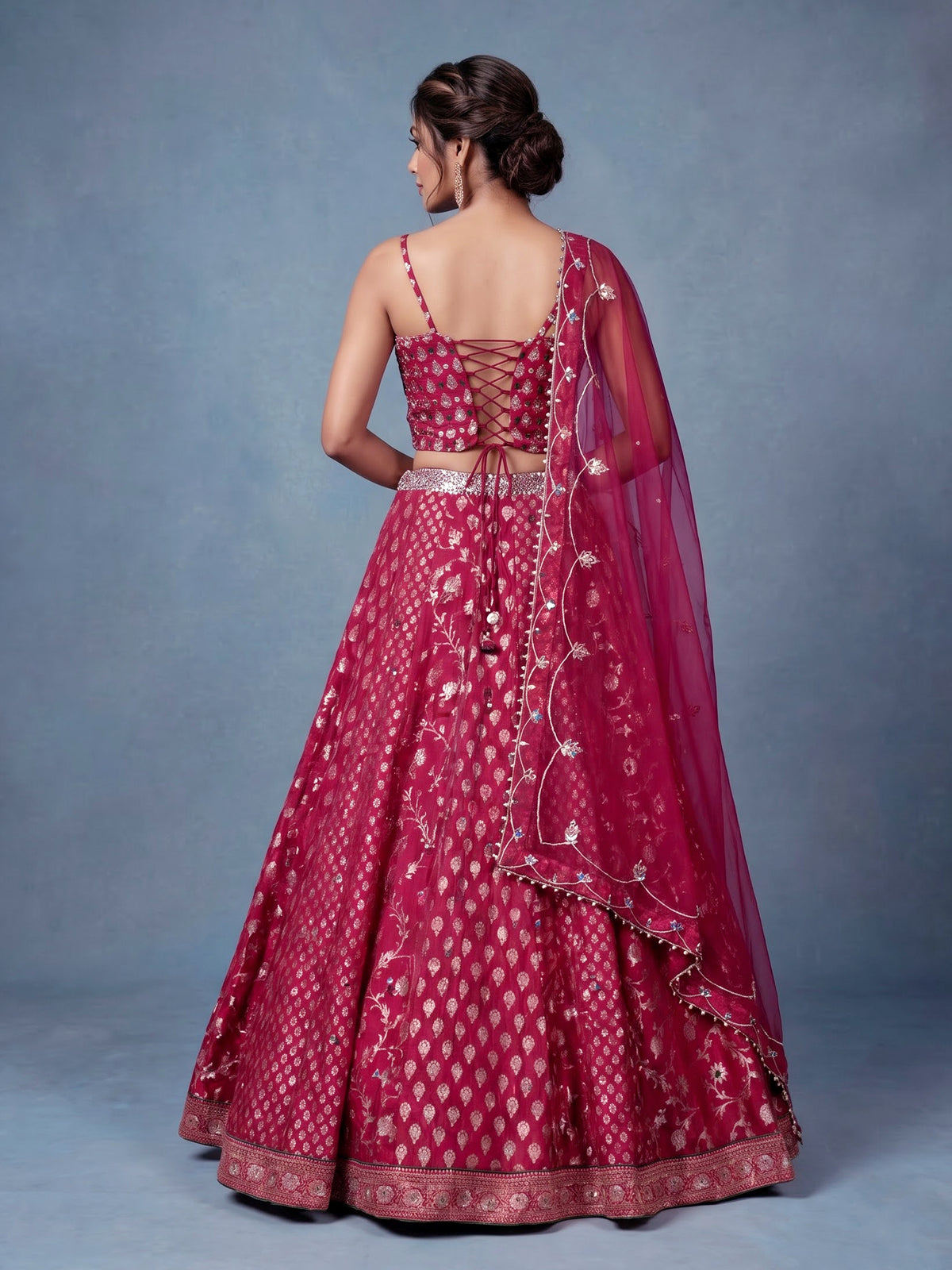 Maroon banarasi silk lehenga choli with embellished dupatta