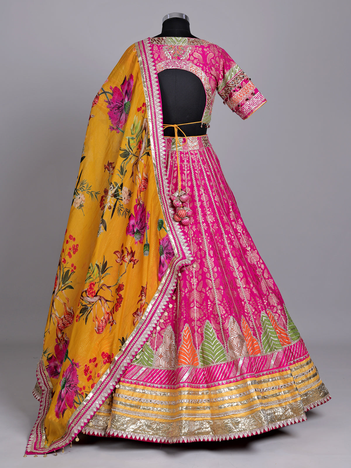 Rani pink banarasi silk lehenga choli with contrast dupatta