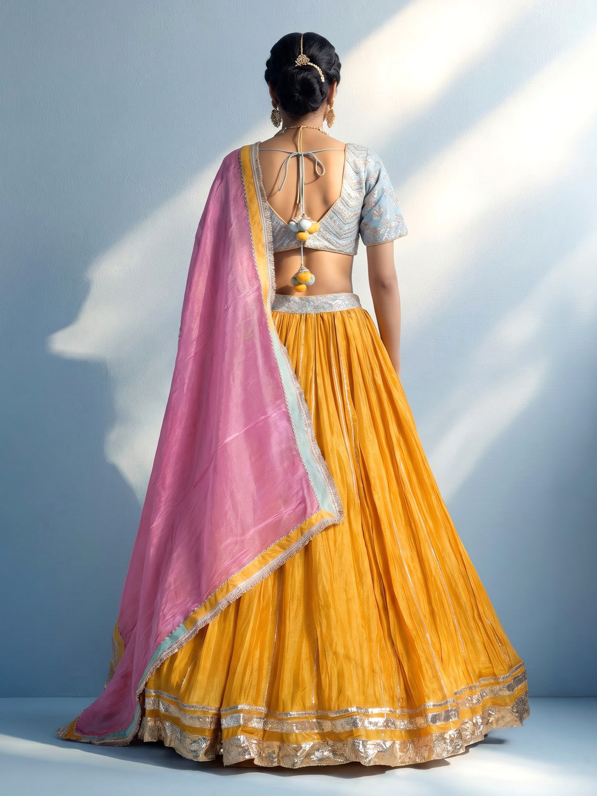 Mustard yellow silk lehenga choli with contrast dupatta choli