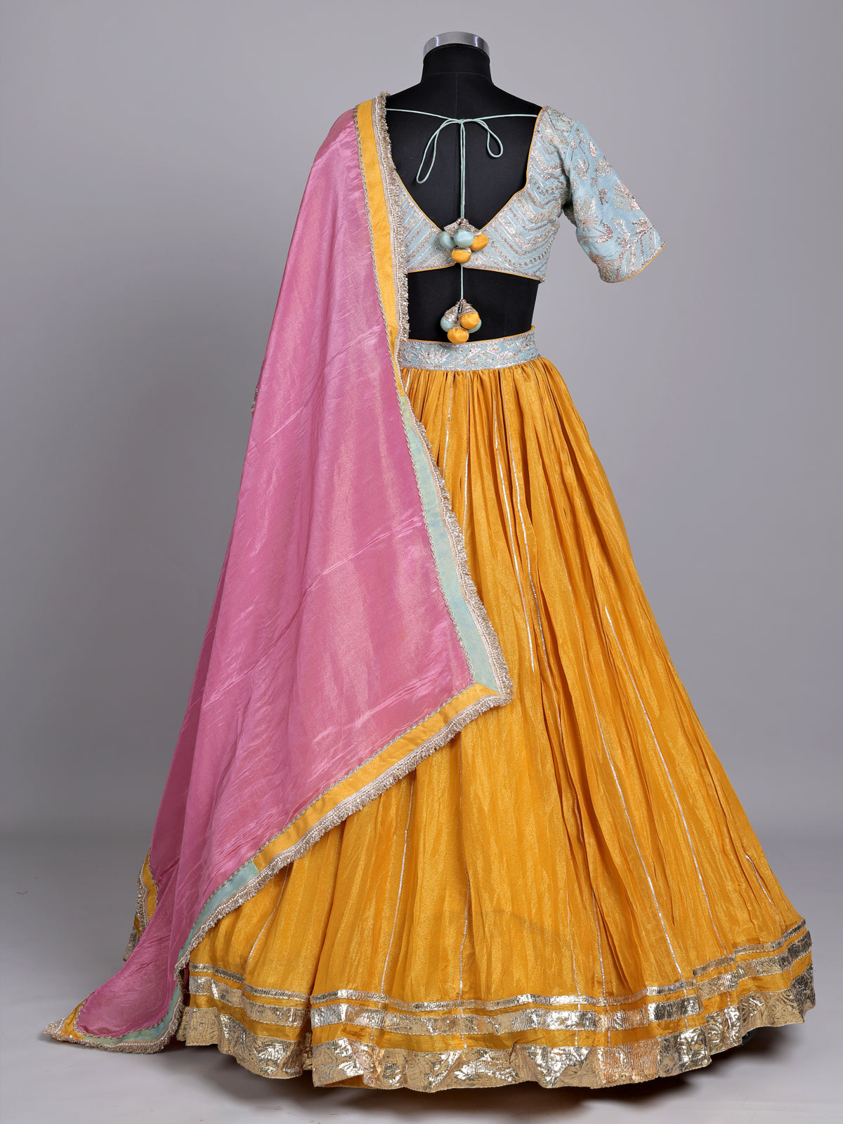 Mustard yellow silk lehenga choli with contrast dupatta choli