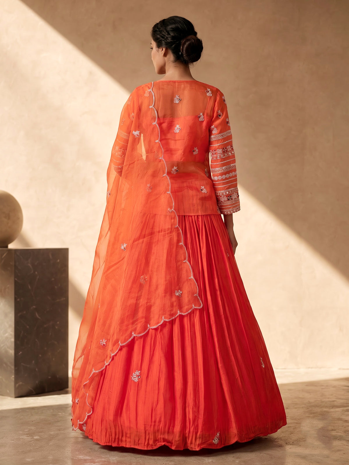 Orange tissue silk lehenga choli with designer three piece styling