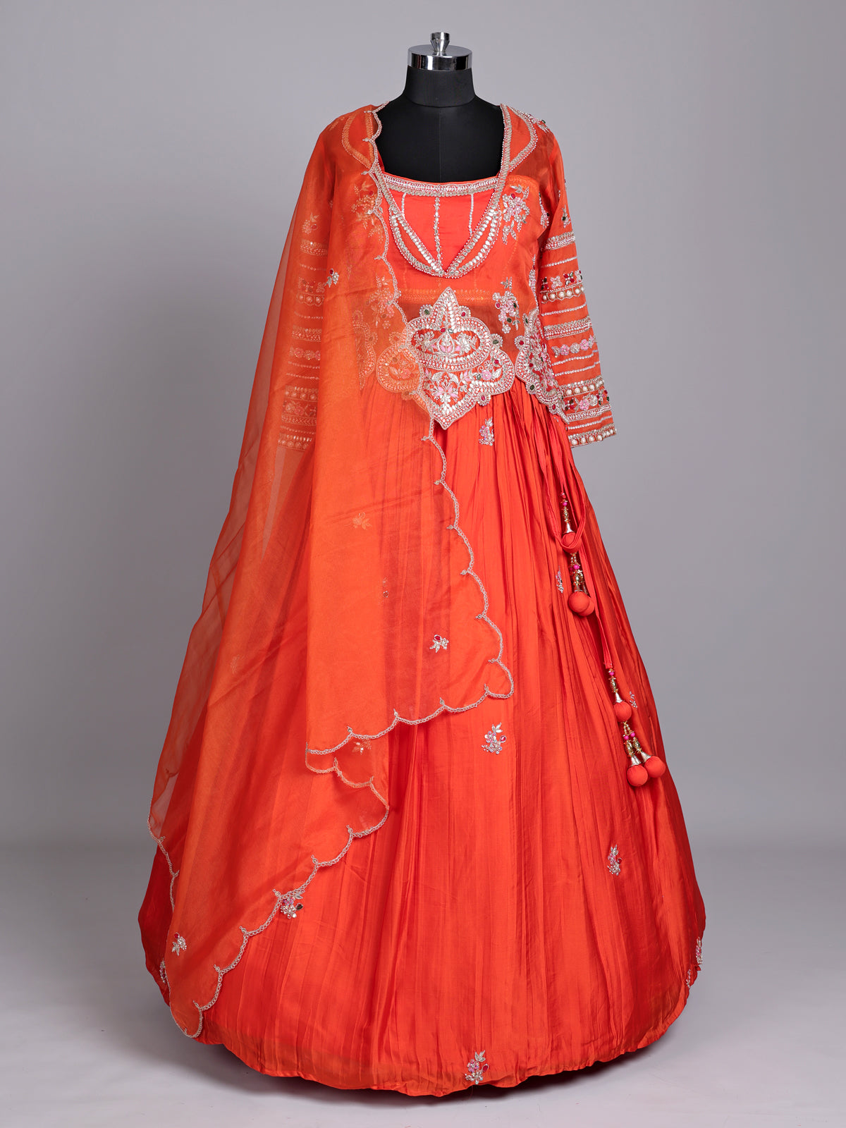 Orange tissue silk lehenga choli with designer three piece styling