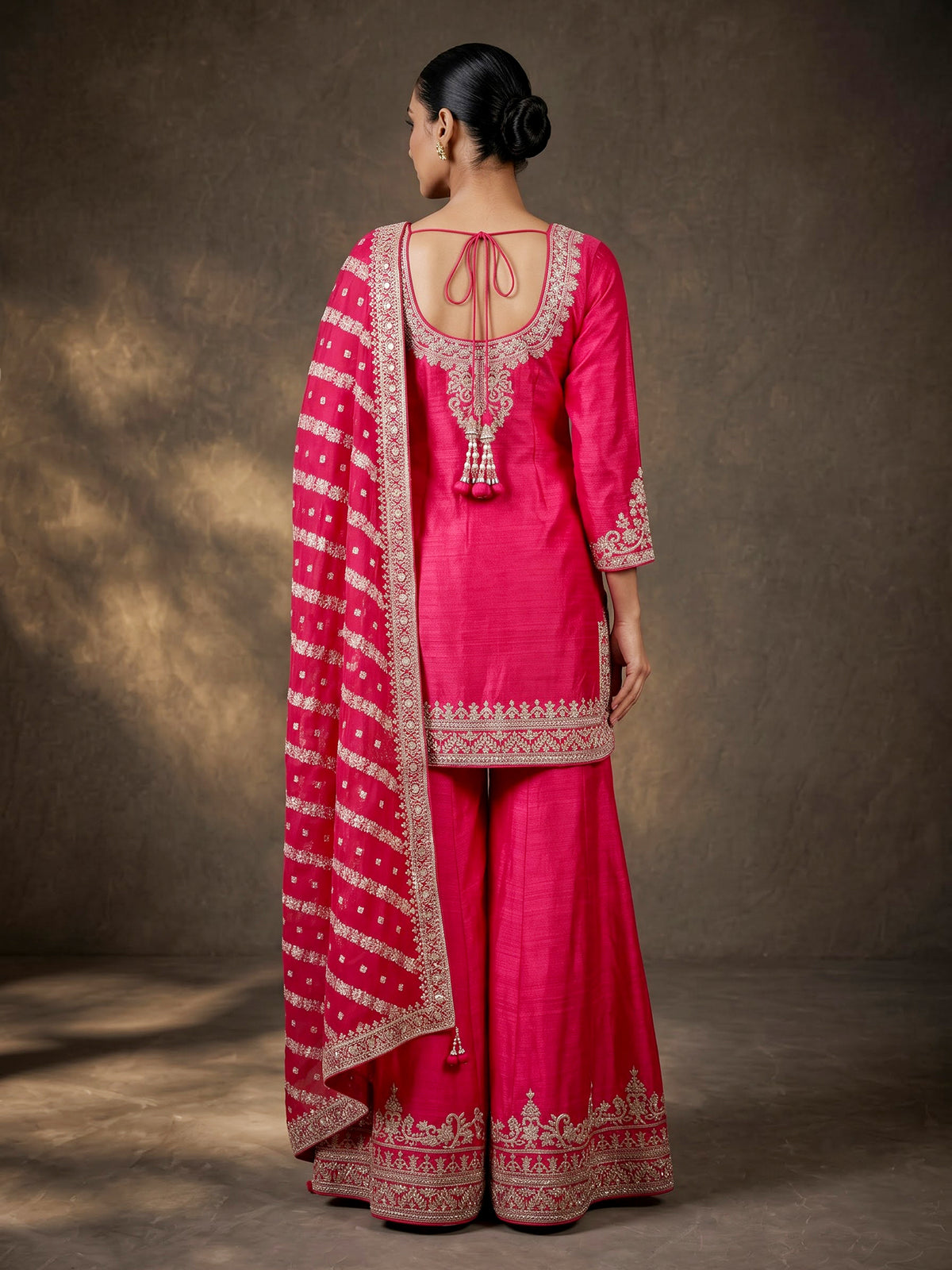 Rani pink raw silk palazzo suit with zari work dupatta
