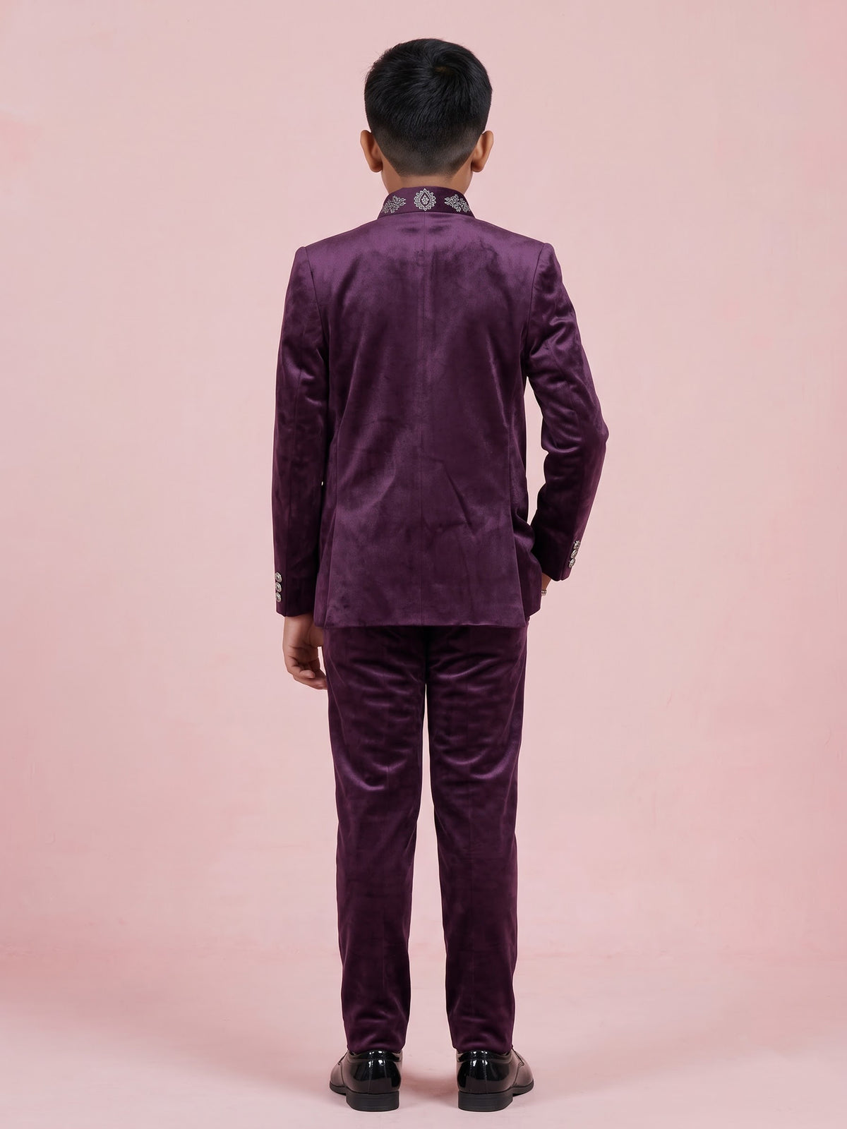 Wine velvet boys Jodhpuri suit with handcrafted crest motif