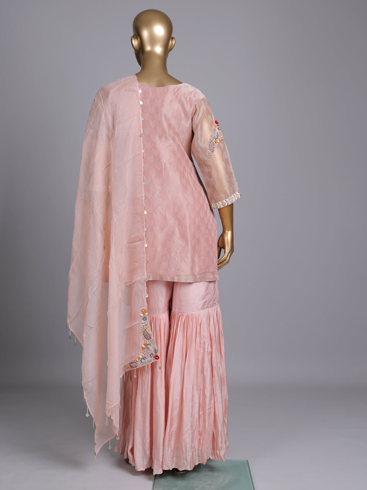 Light peach silk designer sharara suit with ornate embellishments