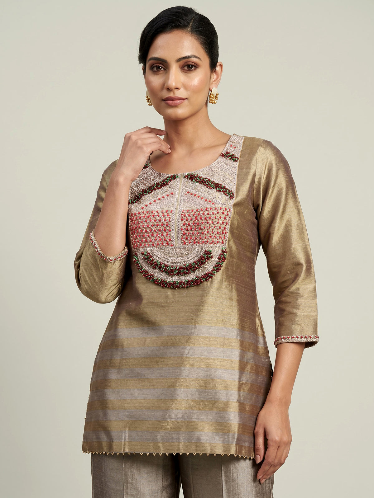 Gold silk yoke style palazzo suit with zardosi and pearls