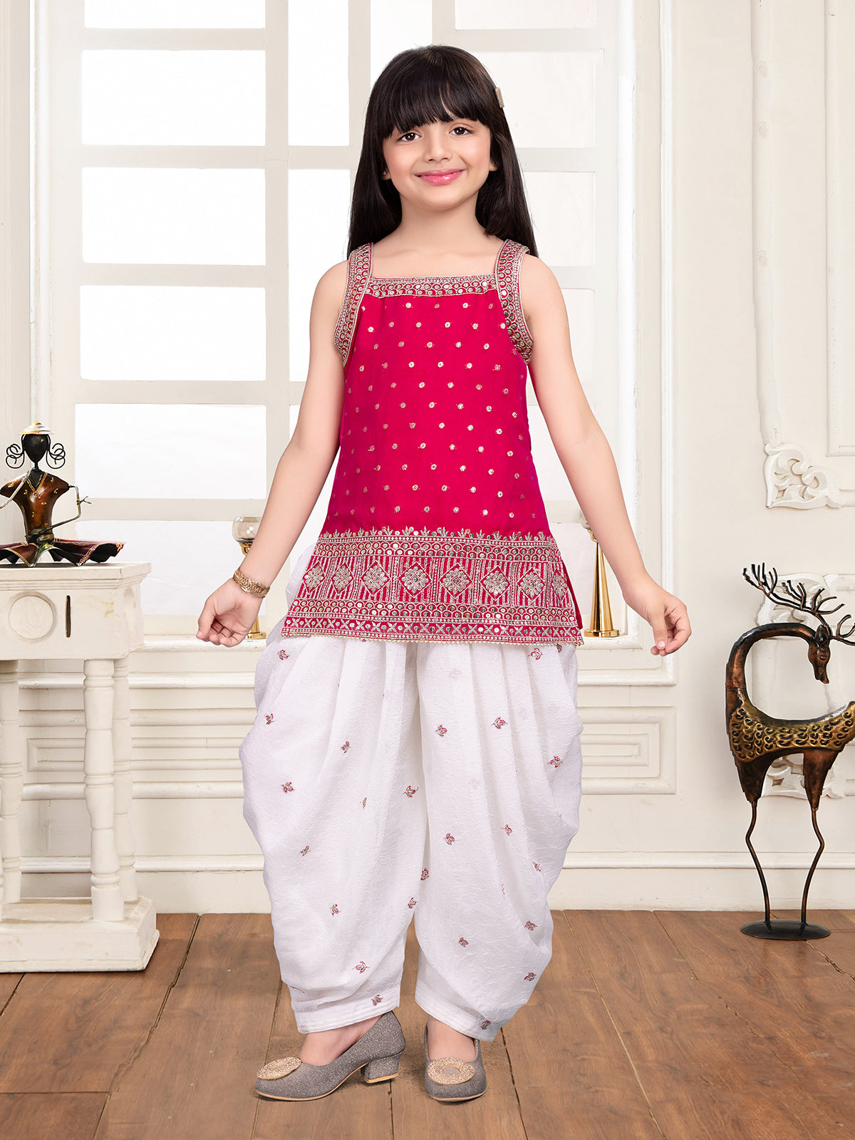 Rani pink silk blend girls embroidered salwar suit
