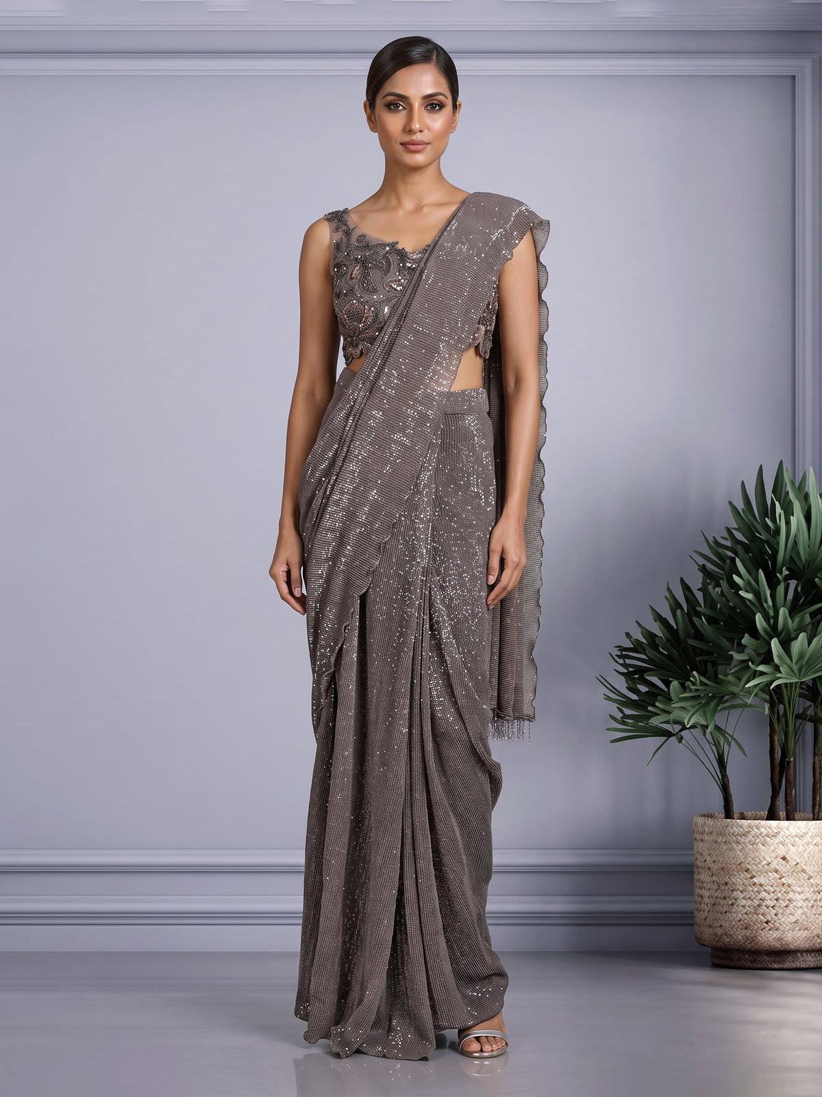 Brown designer net saree with zardosi embellished blouse detailing
