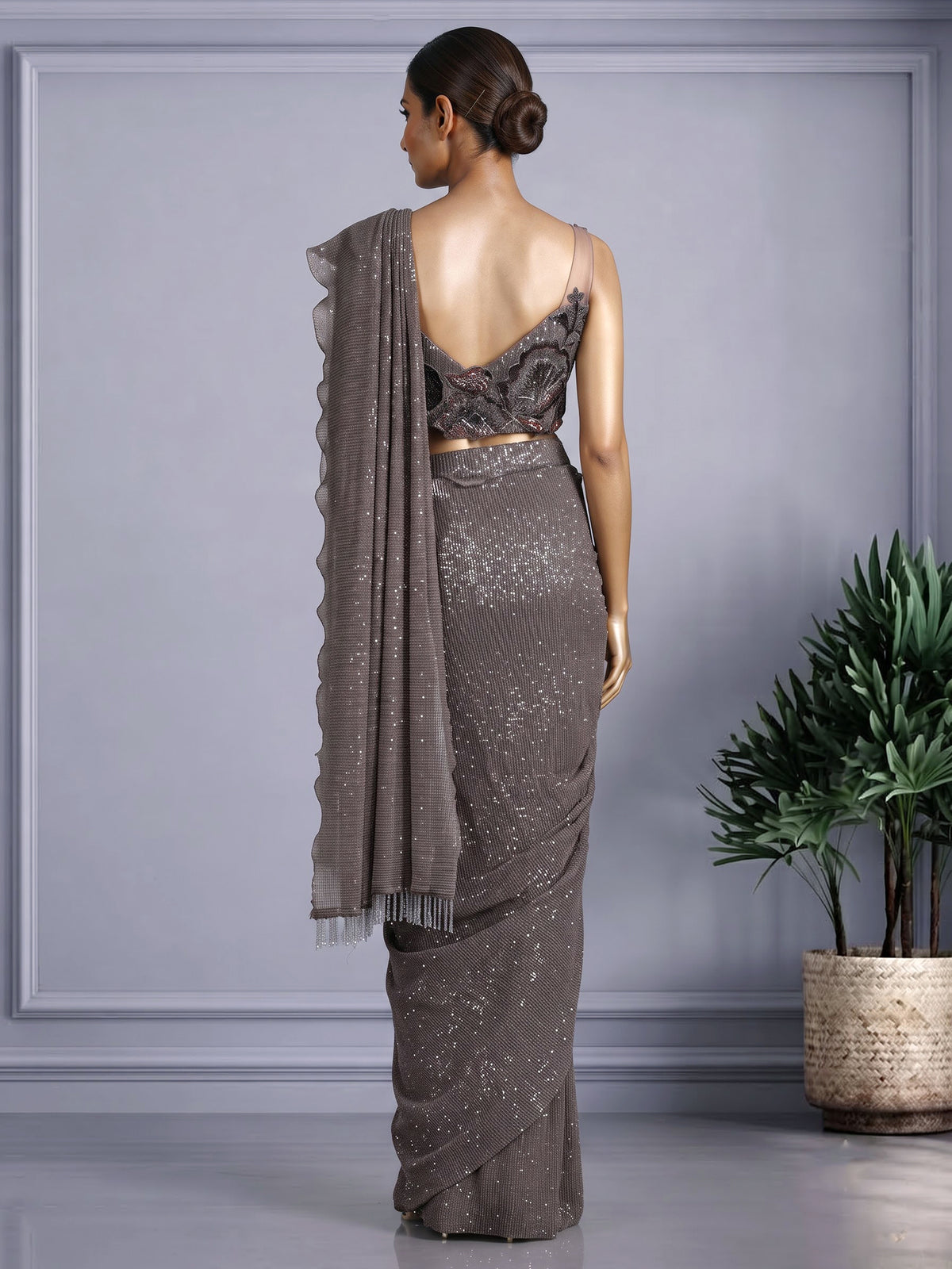 Brown designer net saree with zardosi embellished blouse detailing