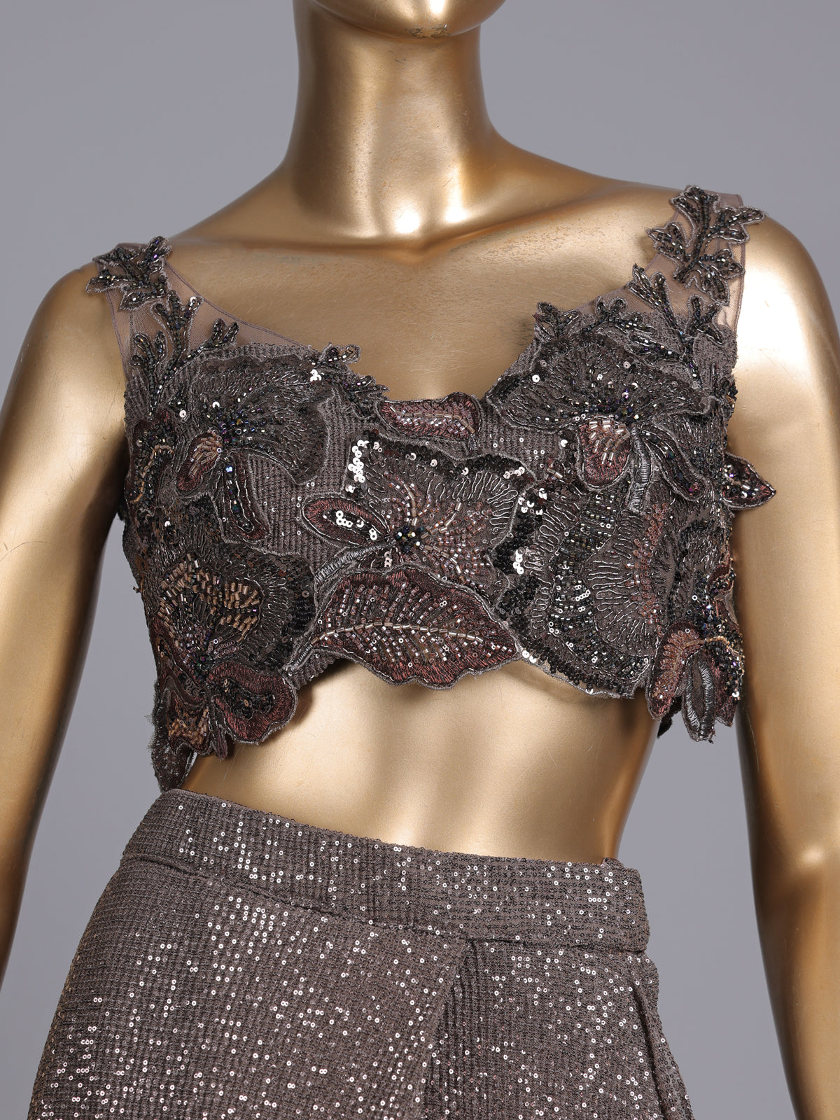Brown designer net saree with zardosi embellished blouse detailing