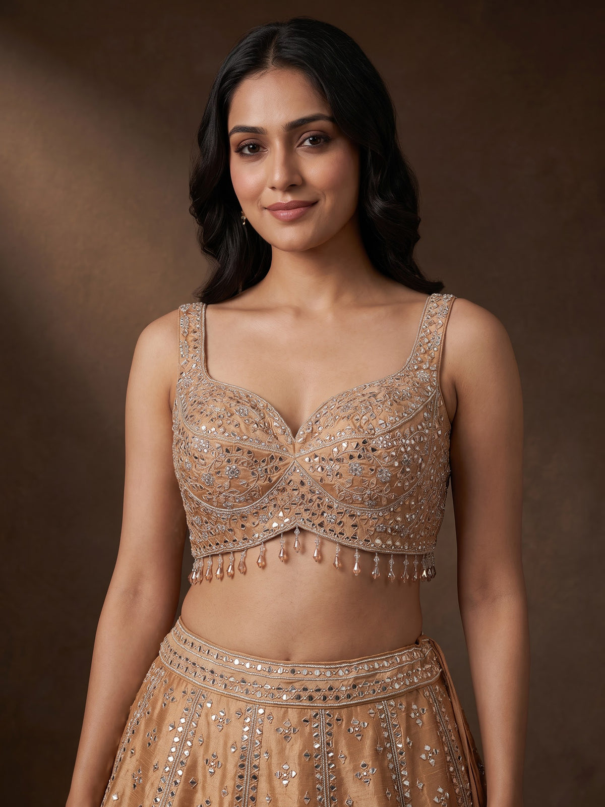 Peach raw silk lehenga choli with elegant diamond and aabla work
