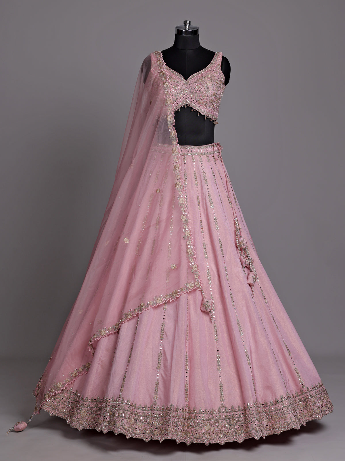 Pink silk lehenga choli with aabla diamond and tassel detailing