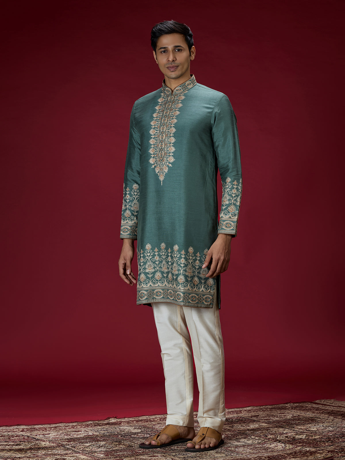 Green ornate embroidered mens kurta suit