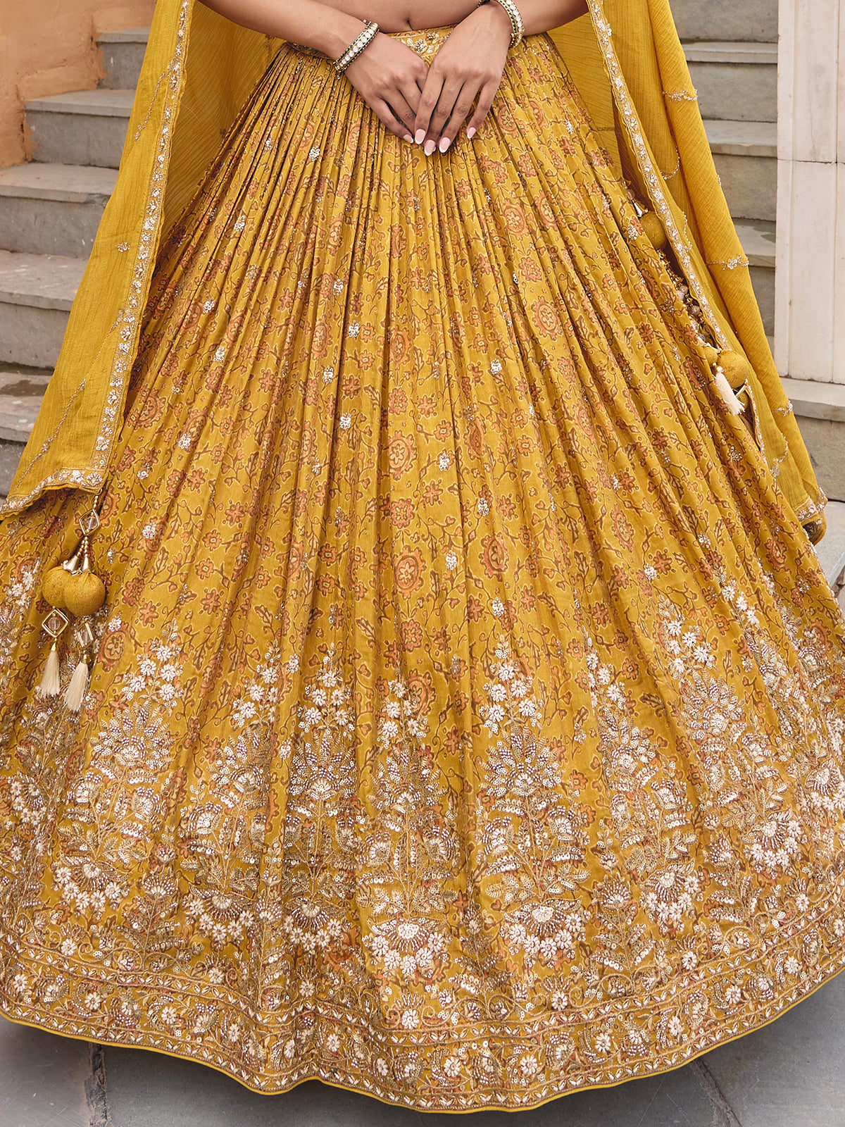 Mustard yellow silk lehenga choli with embellished dupatta