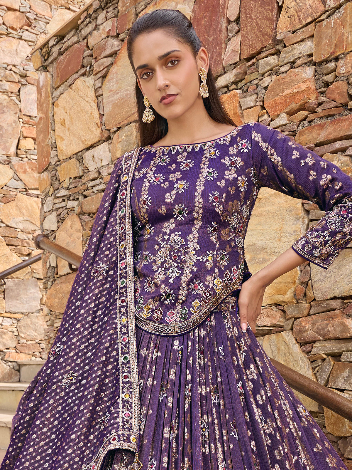 Purple silk lehenga choli with Rajasthani style embellished dupatta
