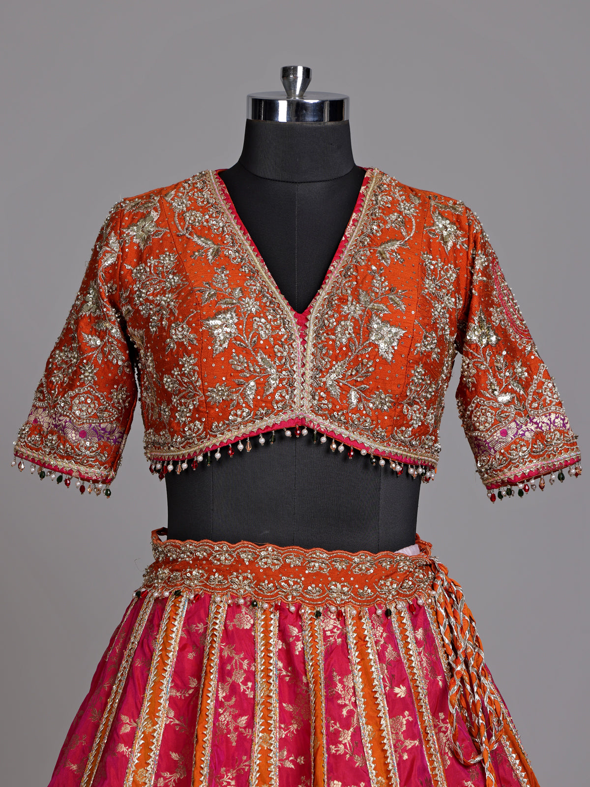 Rust orange jharokha women lehenga choli