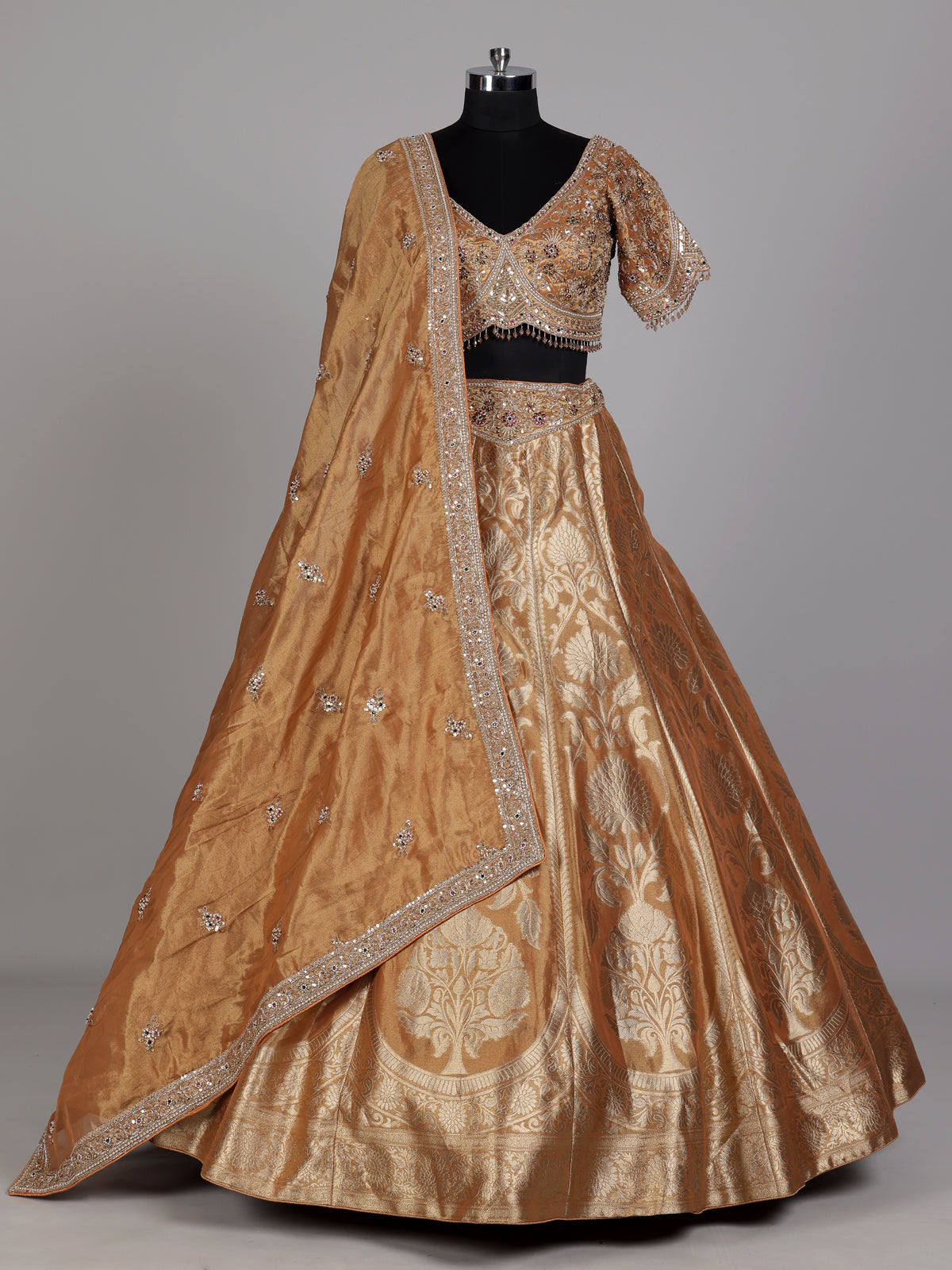 Antique gold banarasi silk lehenga choli with tissue silk dupatta