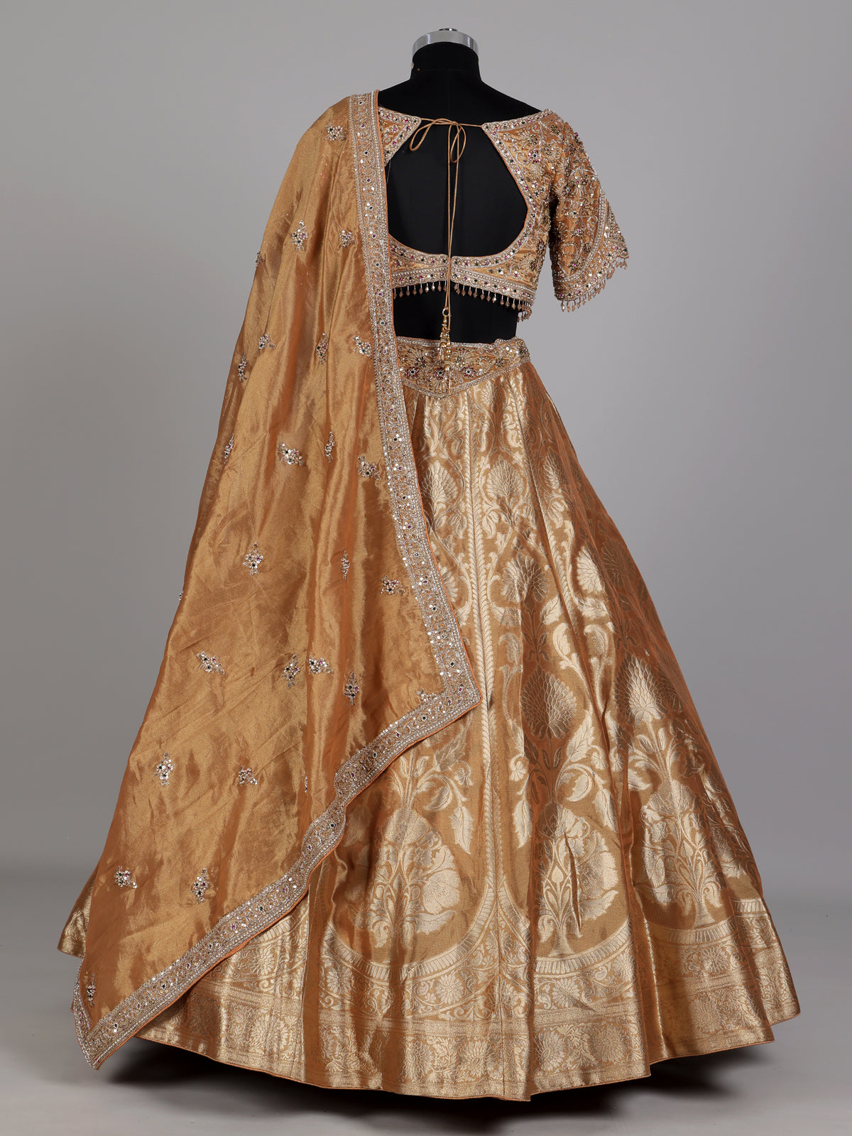 Antique gold banarasi silk lehenga choli with tissue silk dupatta