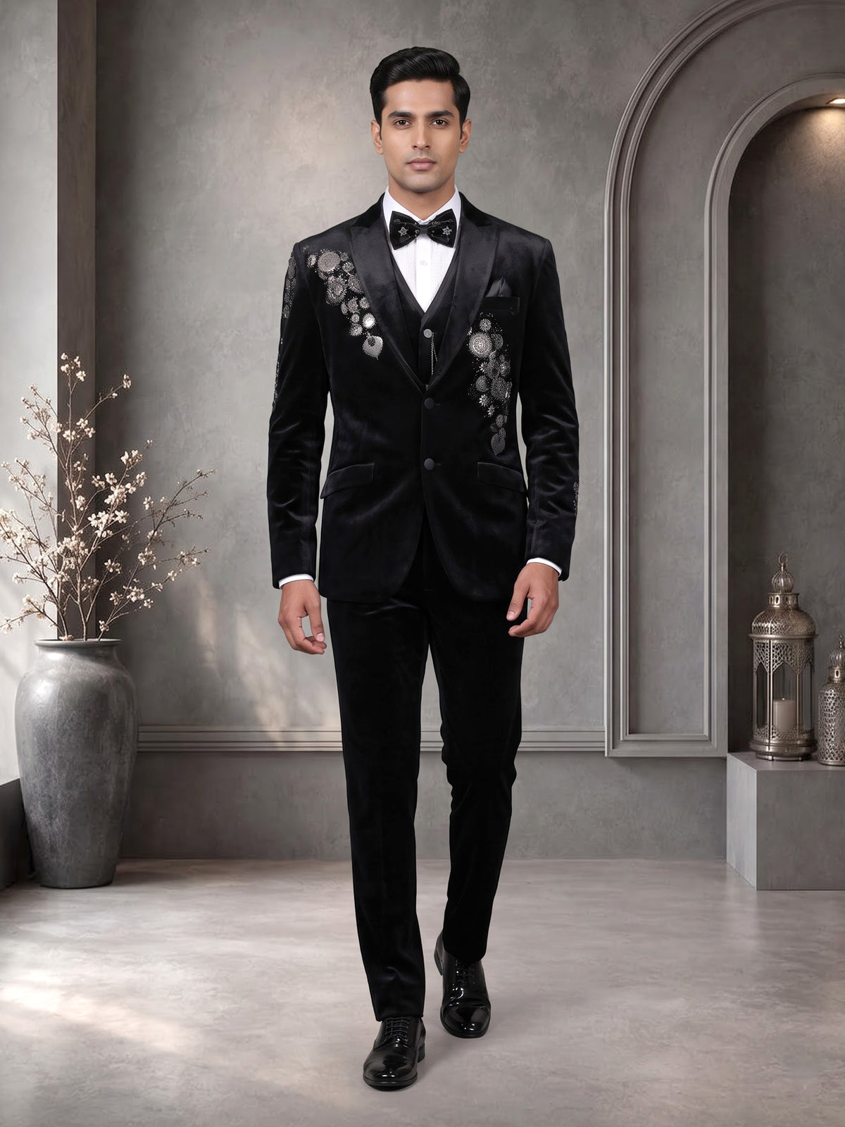 Black velvet tuxedo suit with crystal floral embellishments