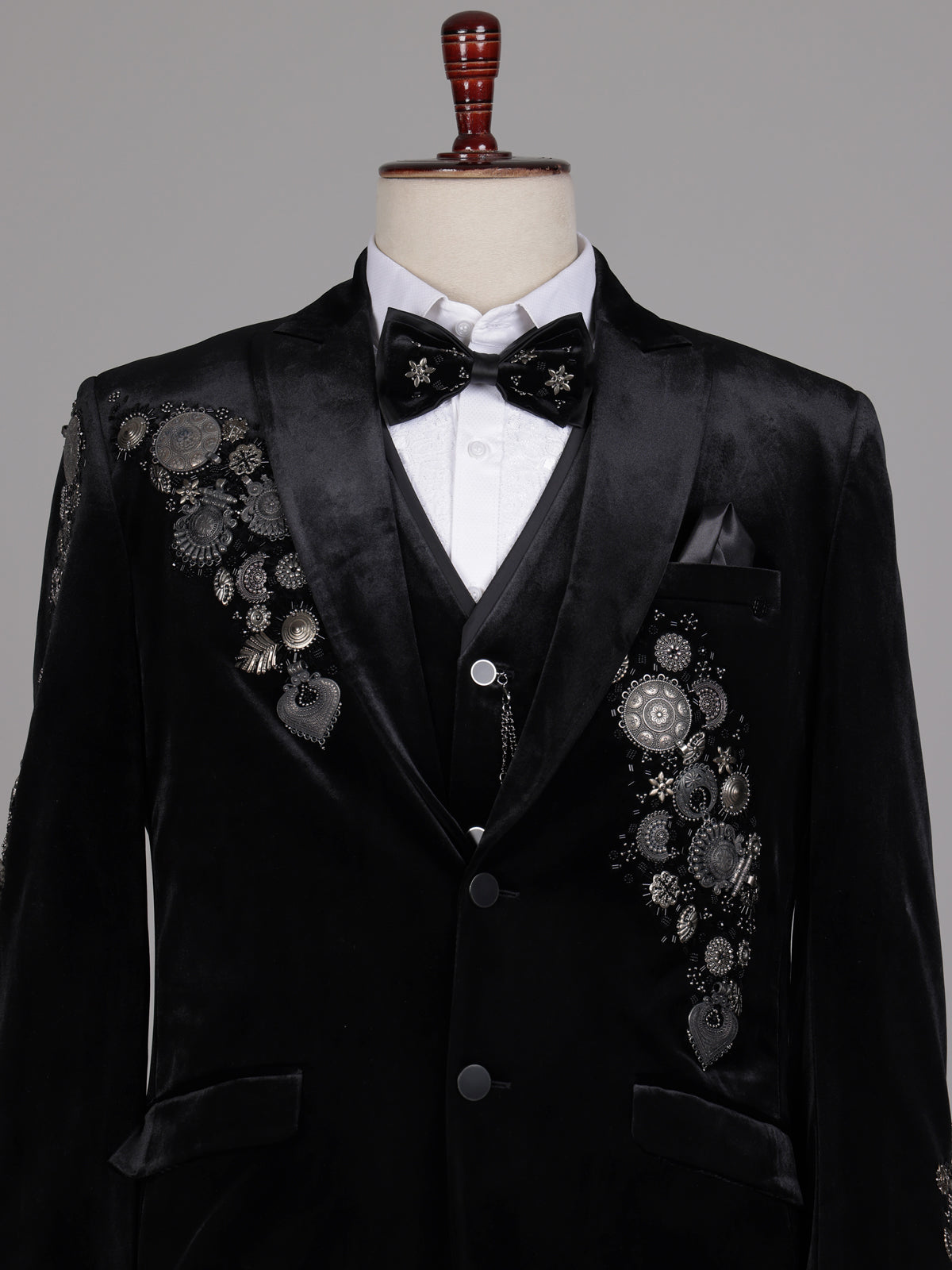 Black velvet tuxedo suit with crystal floral embellishments