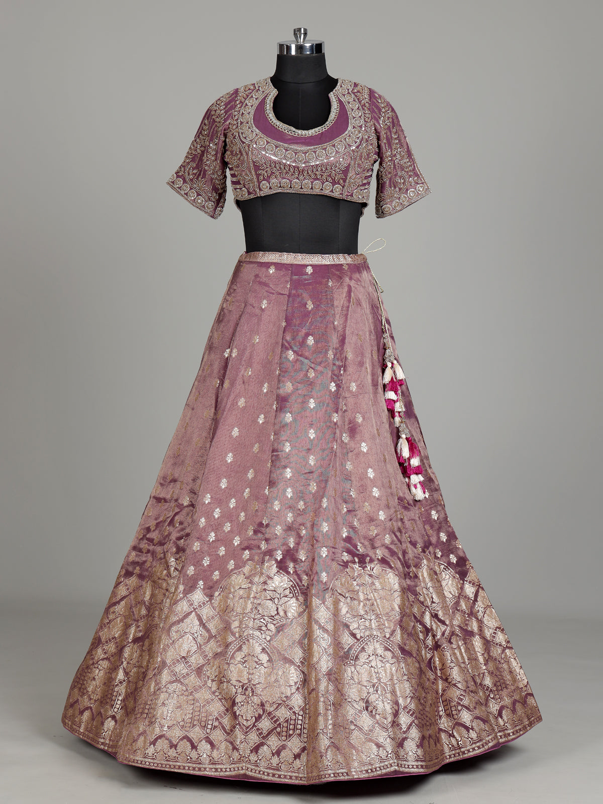 Purple banarasi silk lehenga choli with zari and mirror embellishments