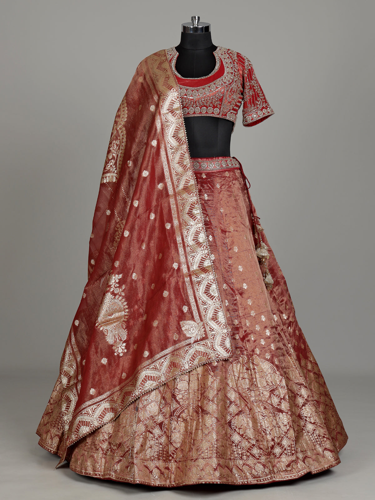 Red banarasi silk lehenga choli with sparkling embellished dupatta