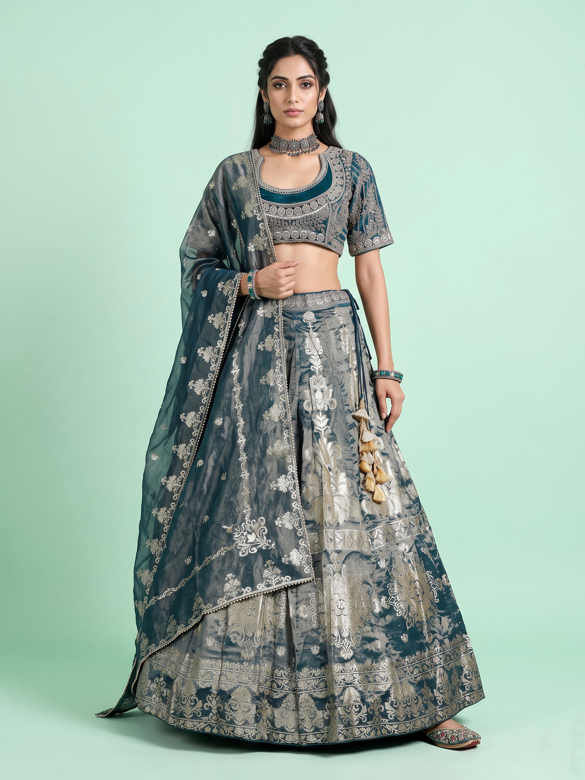 Teal blue banarasi silk lehenga choli with embellished dupatta