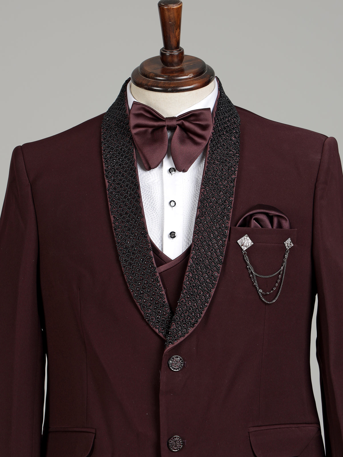 Wine maroon three-piece tuxedo suit with crystal brooch