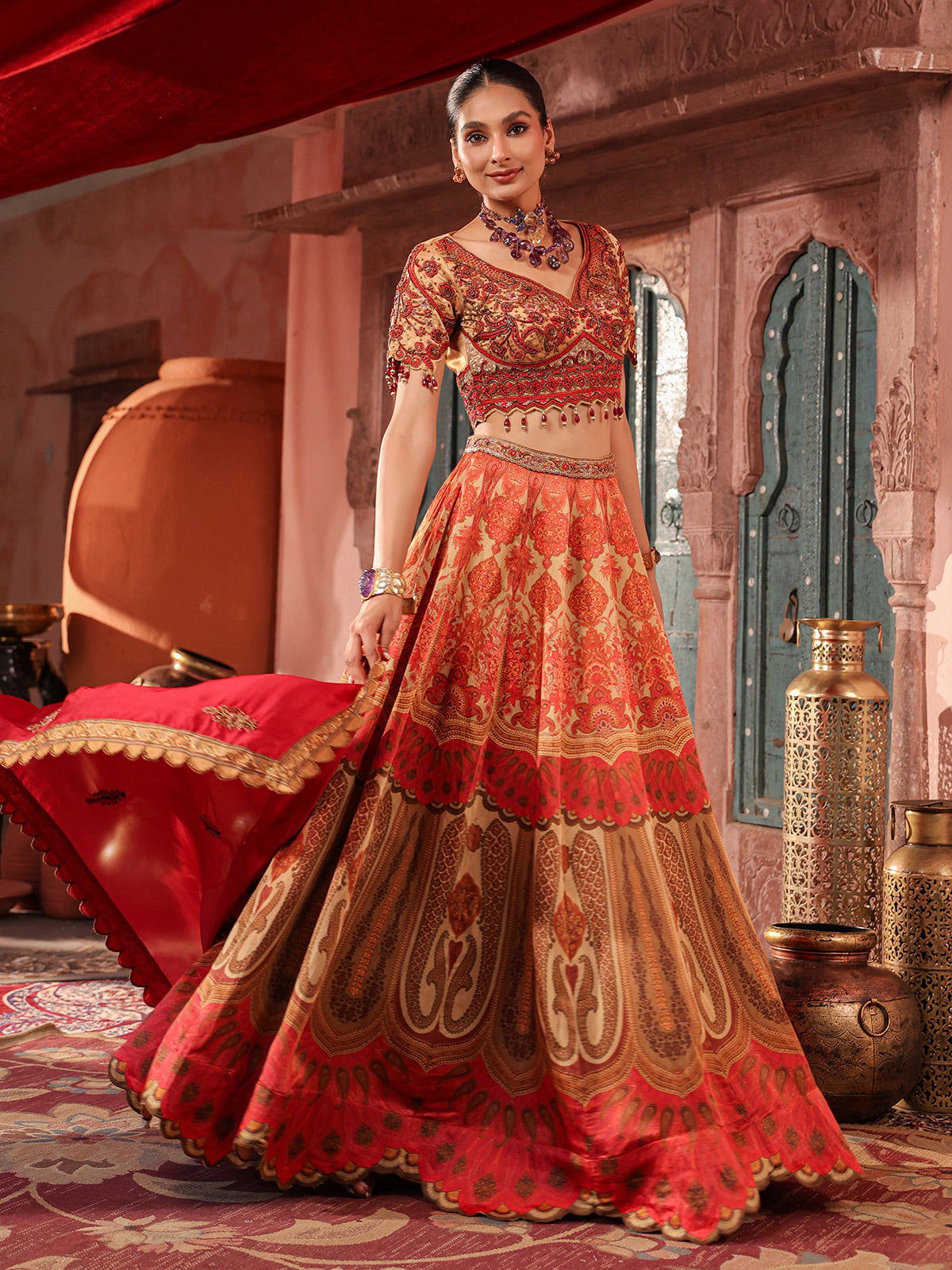 Red traditional printed lehenga choli with intricate zardosi details