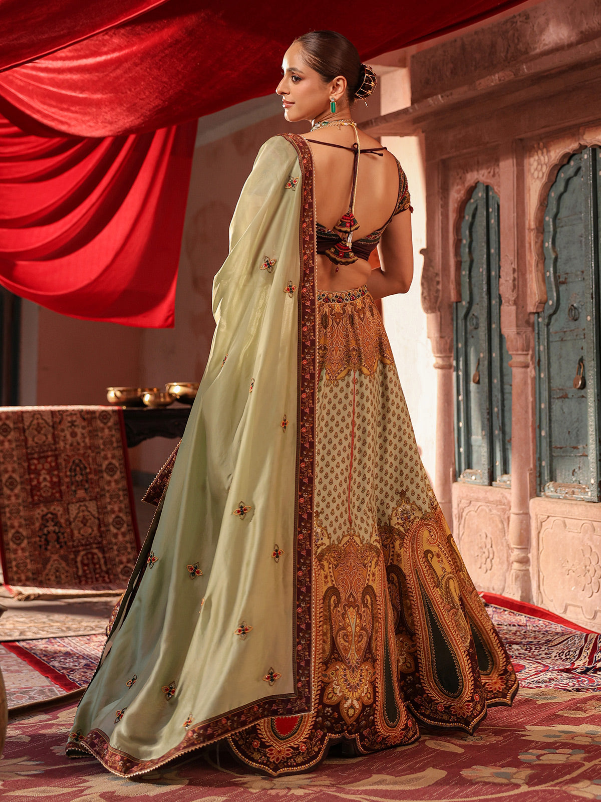 Pista green paisley printed lehenga choli with elegant dupatta