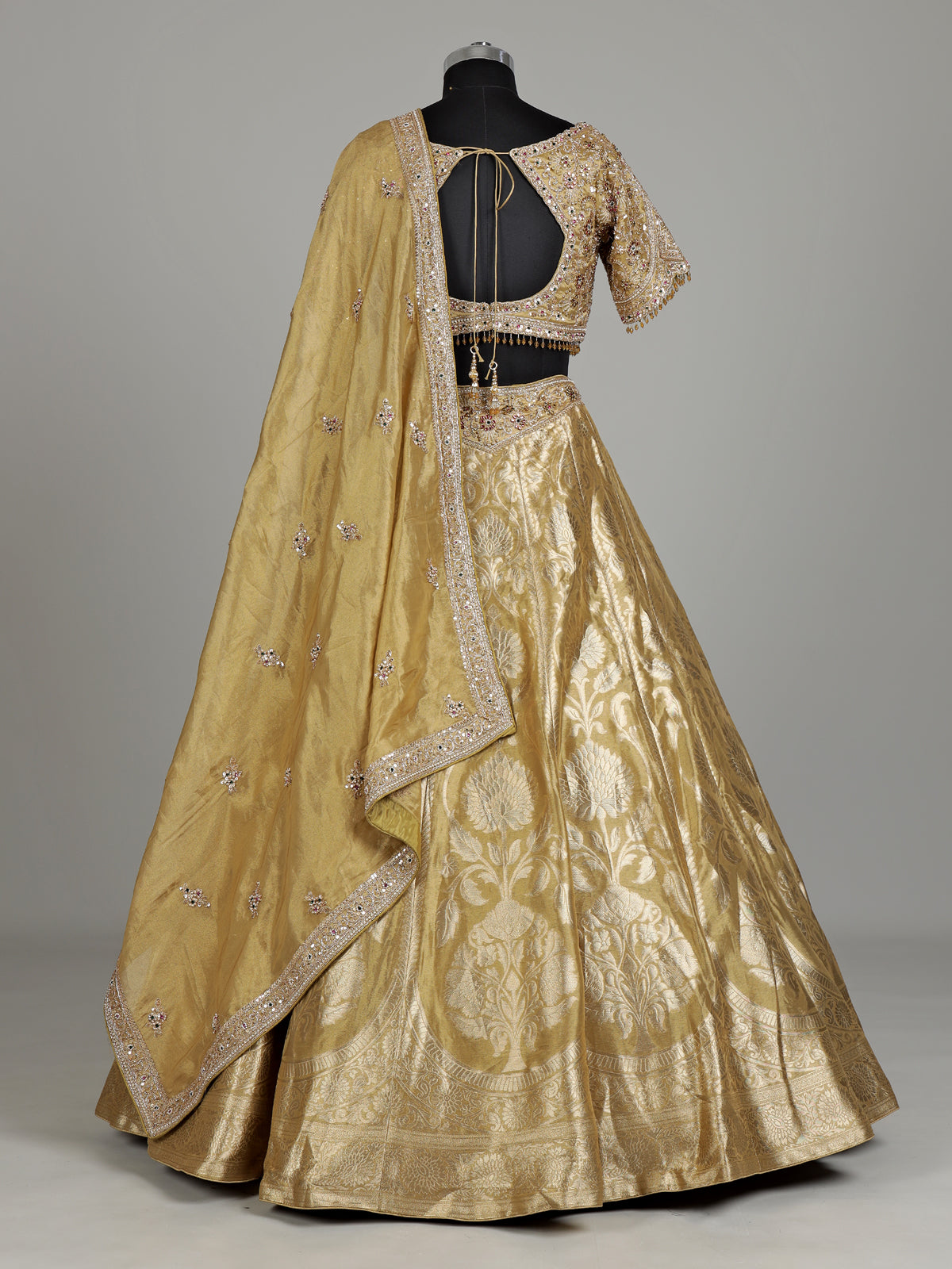Gold banarasi silk designer lehenga with zardosi and embellished dupatta
