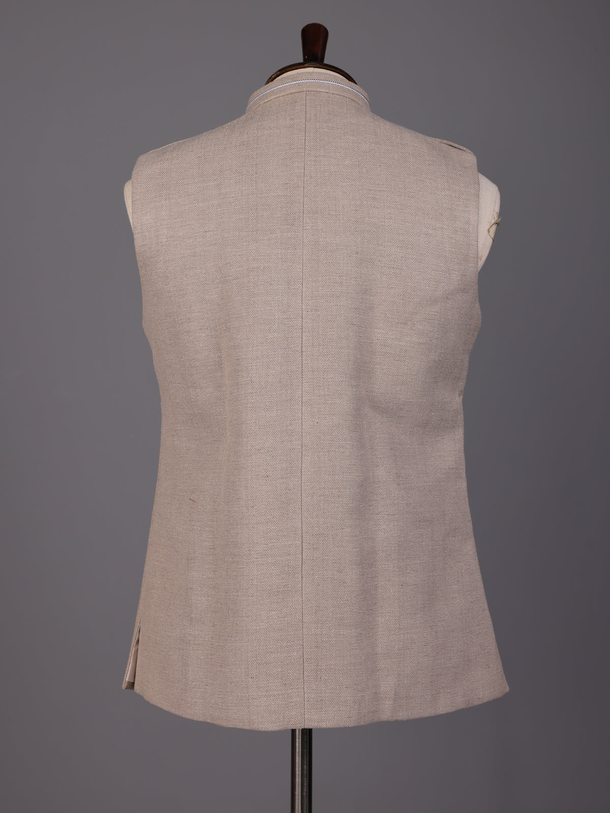 Beige textured waistcoat with metallic chain brooch detailing for mens